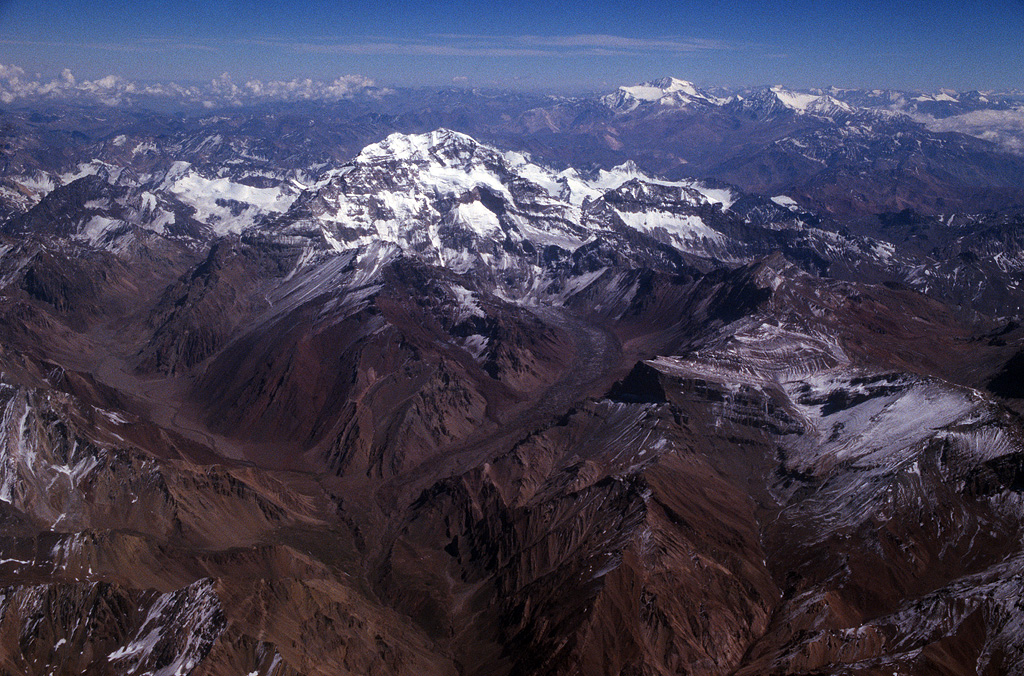 Aerial view of Aconcagua's south wall, and the Plaza Francia campsite below. Normal route goes through the Horcones valley on the left, in the backround is the ridge of Cordillera de la Ramada.