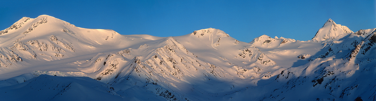 Freezing morning on Zufall glacier. From left: Monte Cevedale (3769m), Suldenspitze (3376m), Königspitze (3851m).