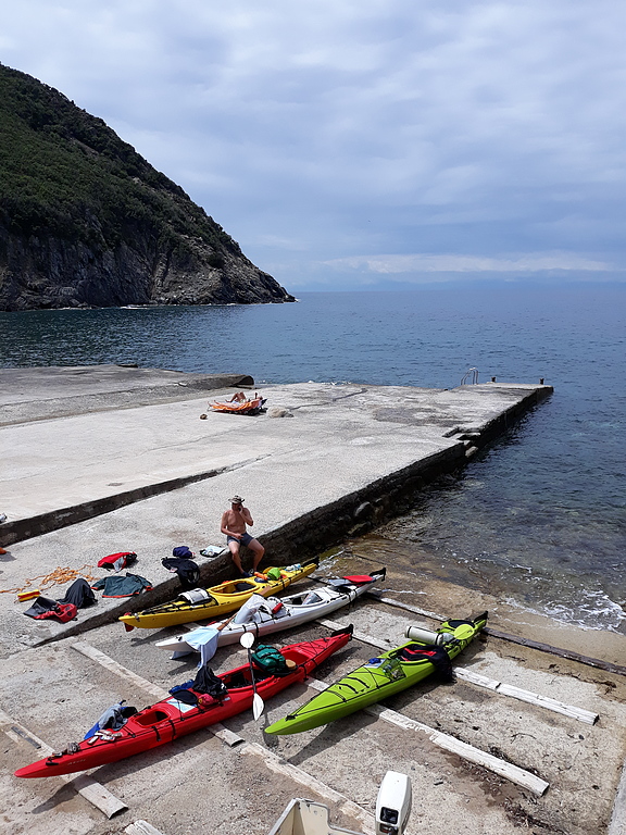 Sea kayaking around Elba island.