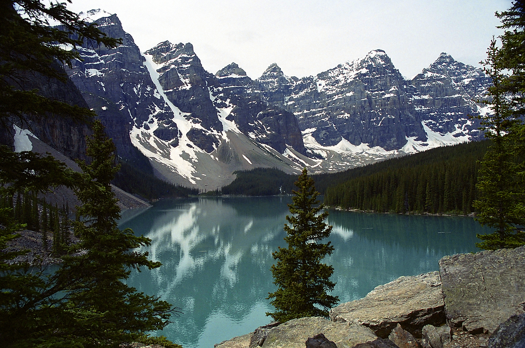 Unforgettably turquoise Moraine Lake surrounded by mountains over 3000m in the Valley of the Ten Peaks.